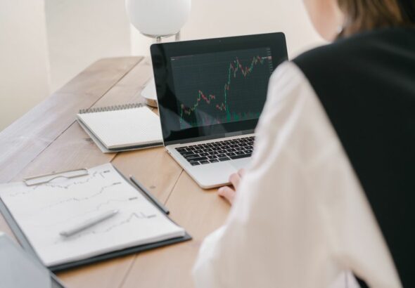 Professional futures trading setup with financial charts and order execution terminals
